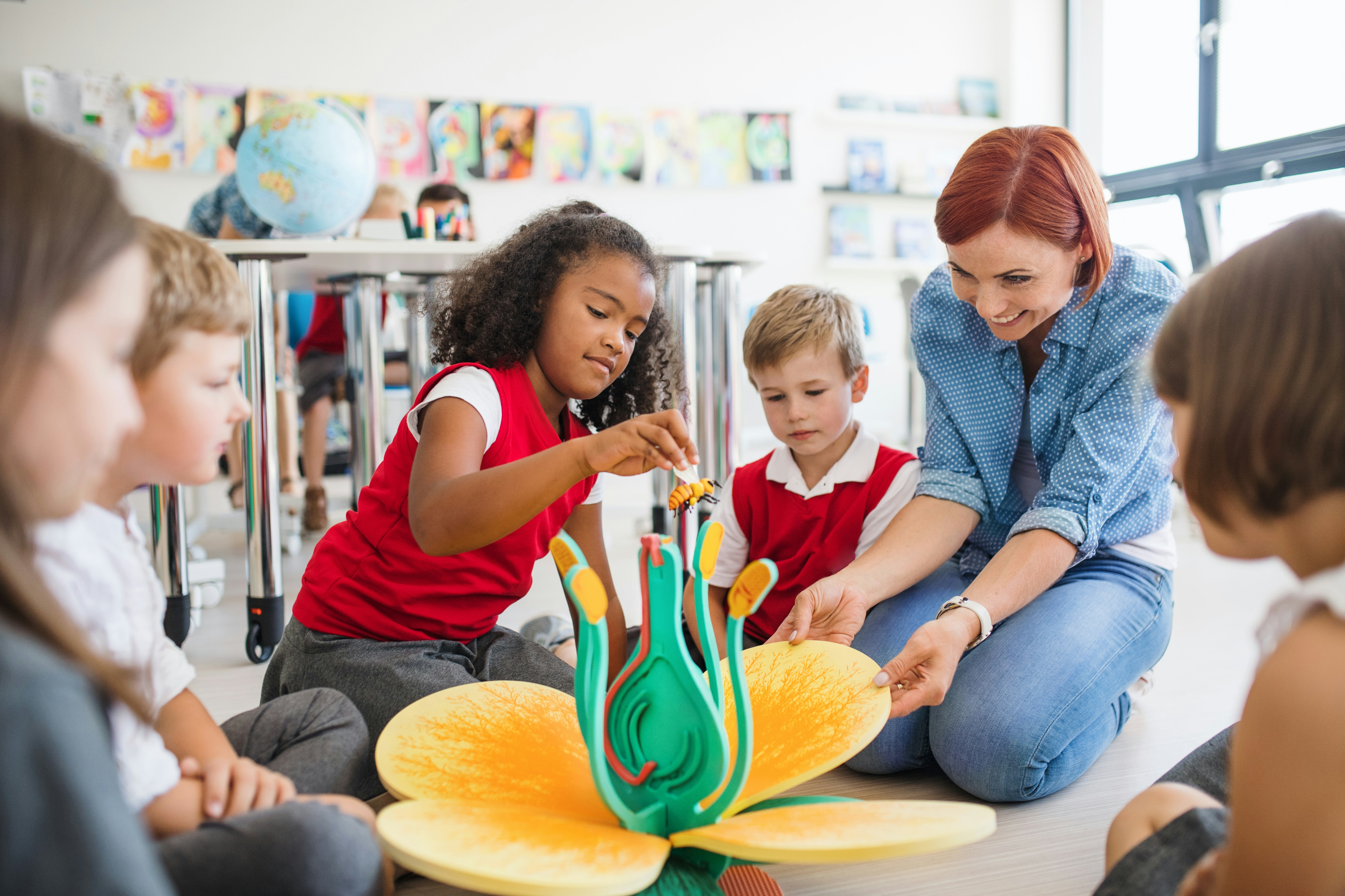teacher-playing-with-children